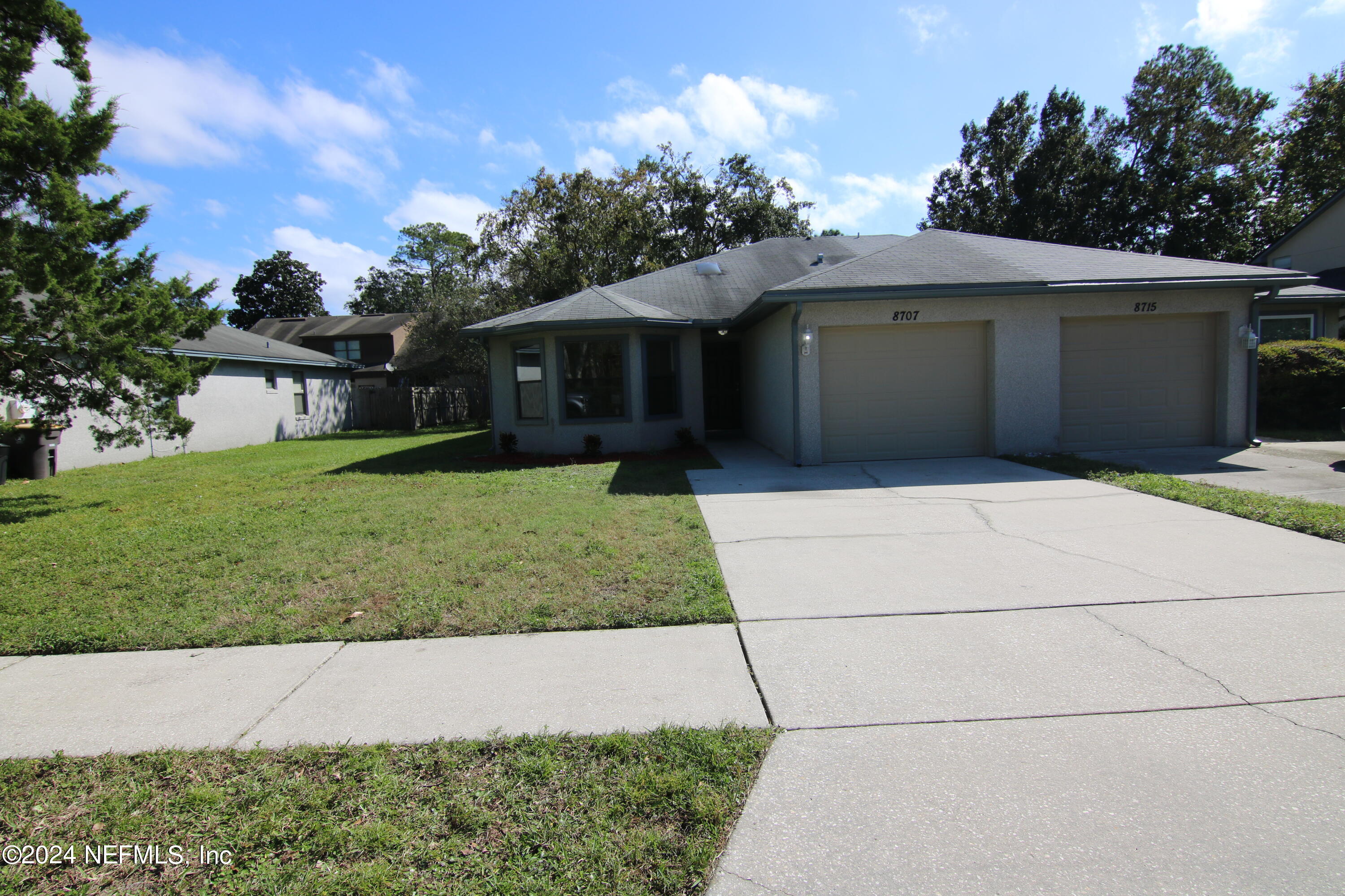 a front view of house with yard