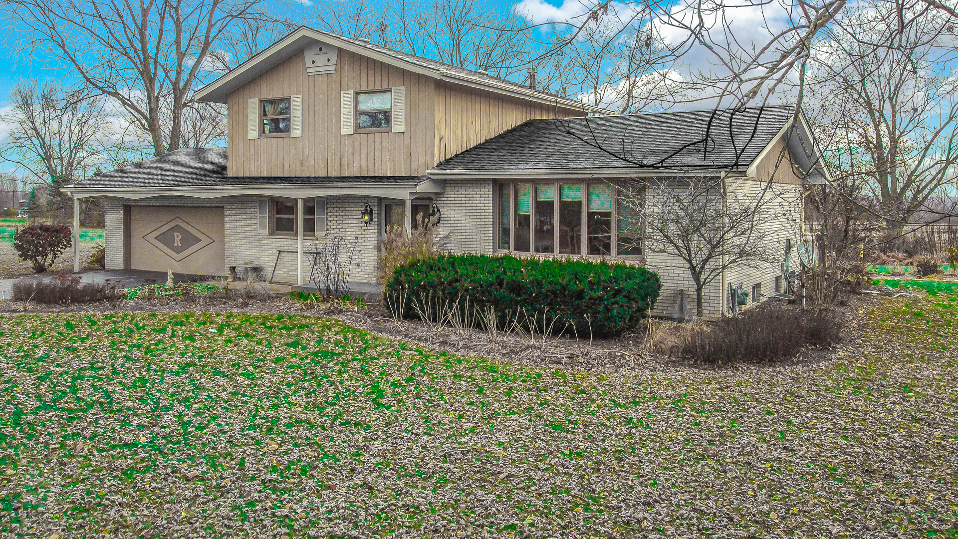 a view of a yard in front of house