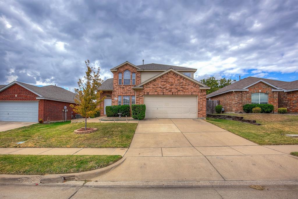 a front view of house with yard