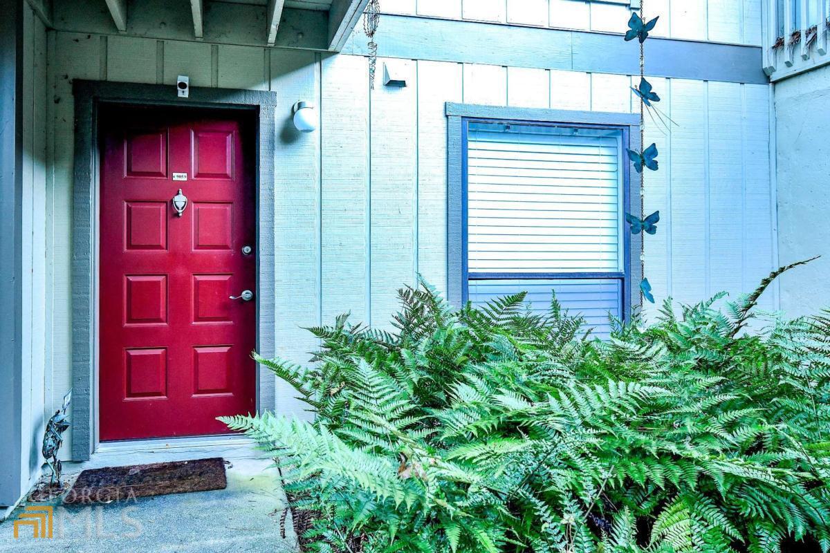 a view of a red door of the house