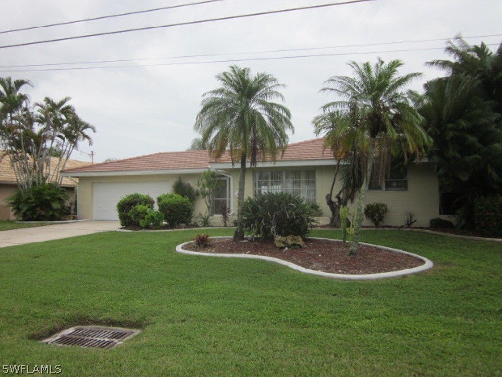 a view of a backyard with a sitting area and tub