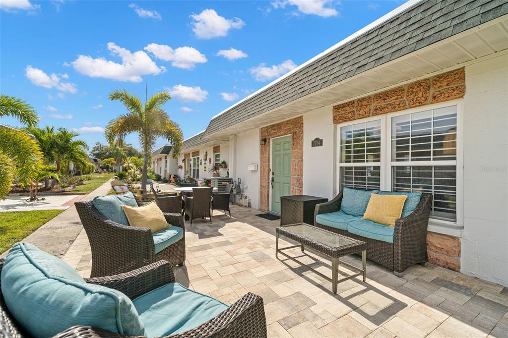 a building outdoor space with patio furniture