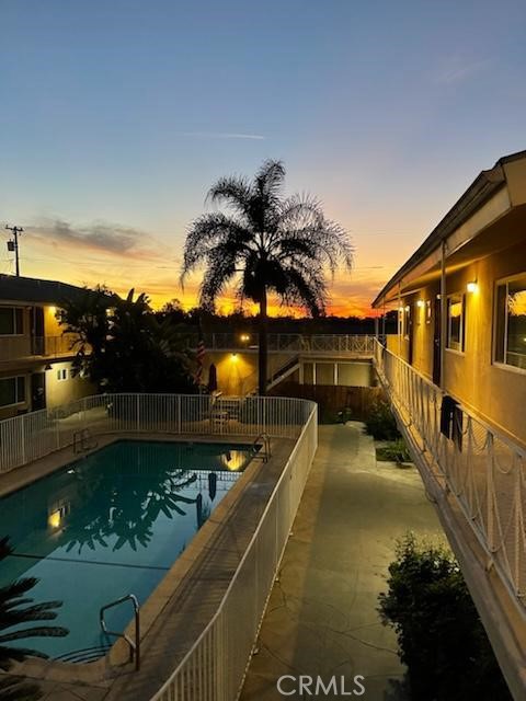 a view of a swimming pool with a lounge chairs