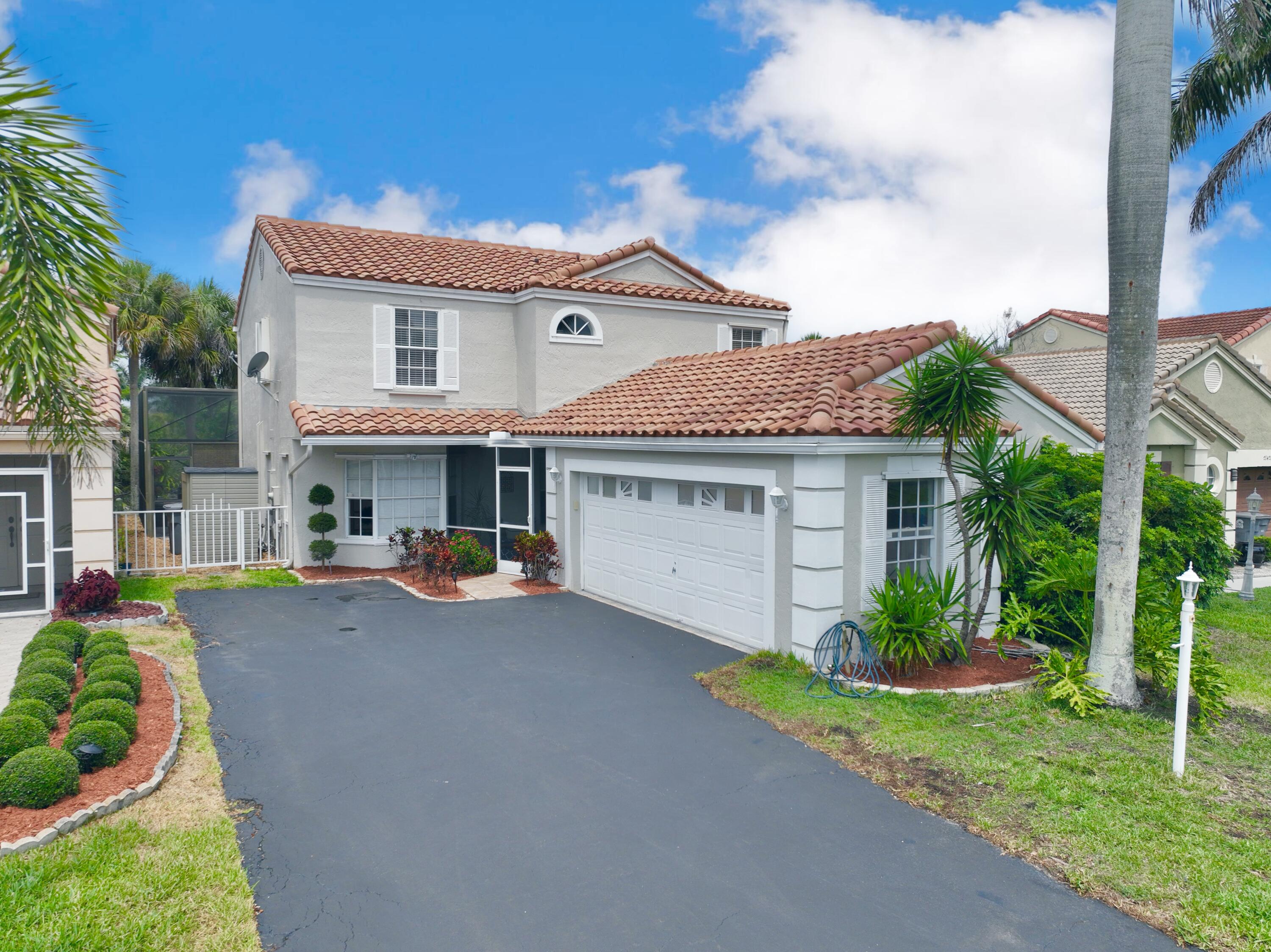 a view of house with outdoor space and entertaining space