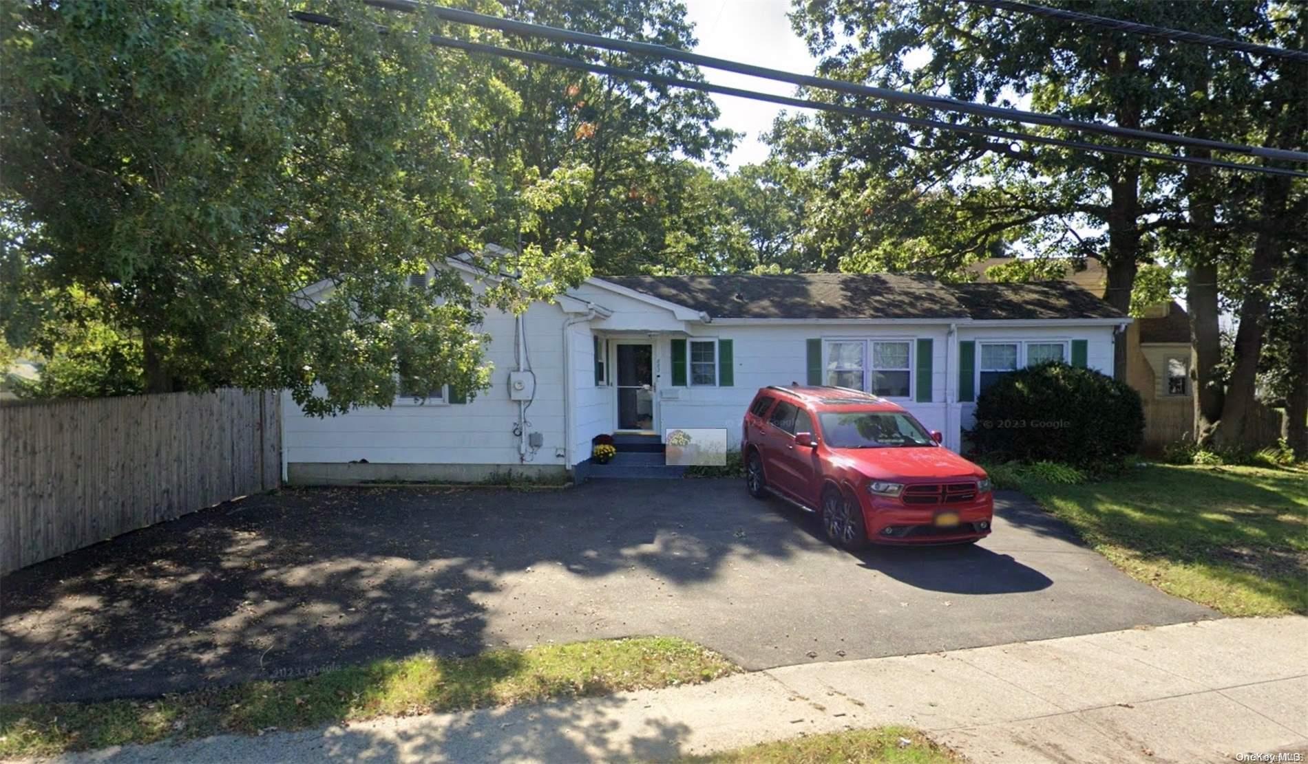 a front view of a house with patio