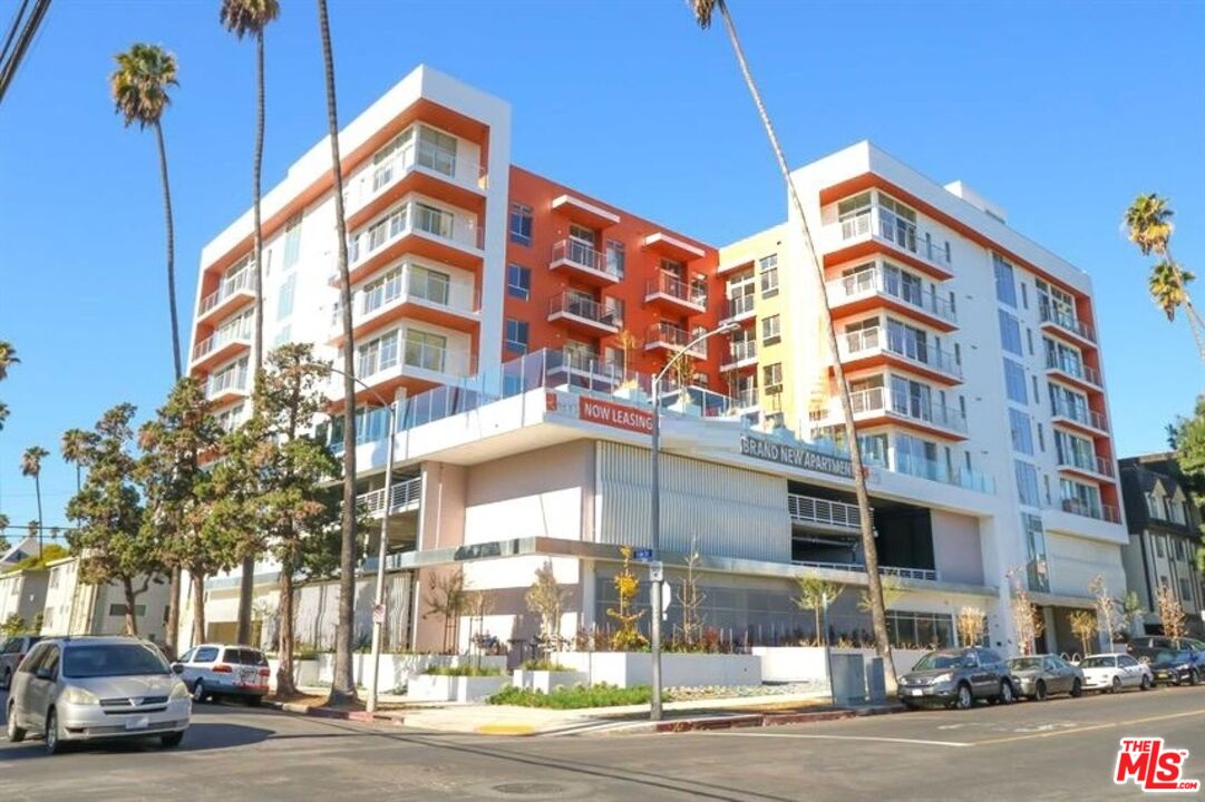 a front view of a building and a street