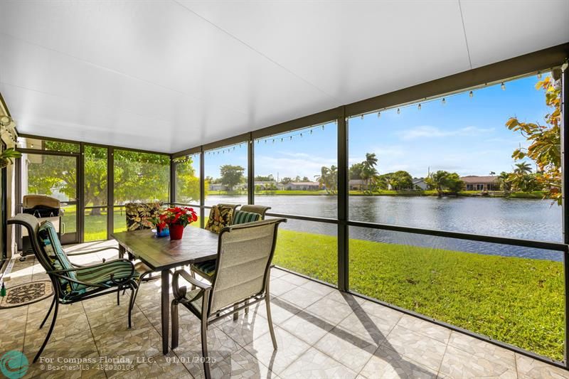 Screened in patio with lake views