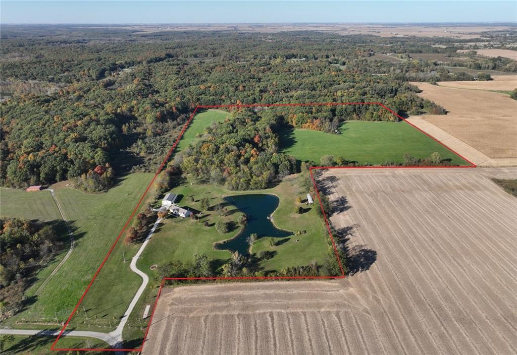 an aerial view of a house with a garden