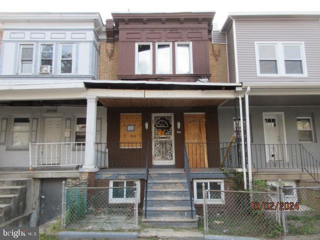 front view of a brick house with a window