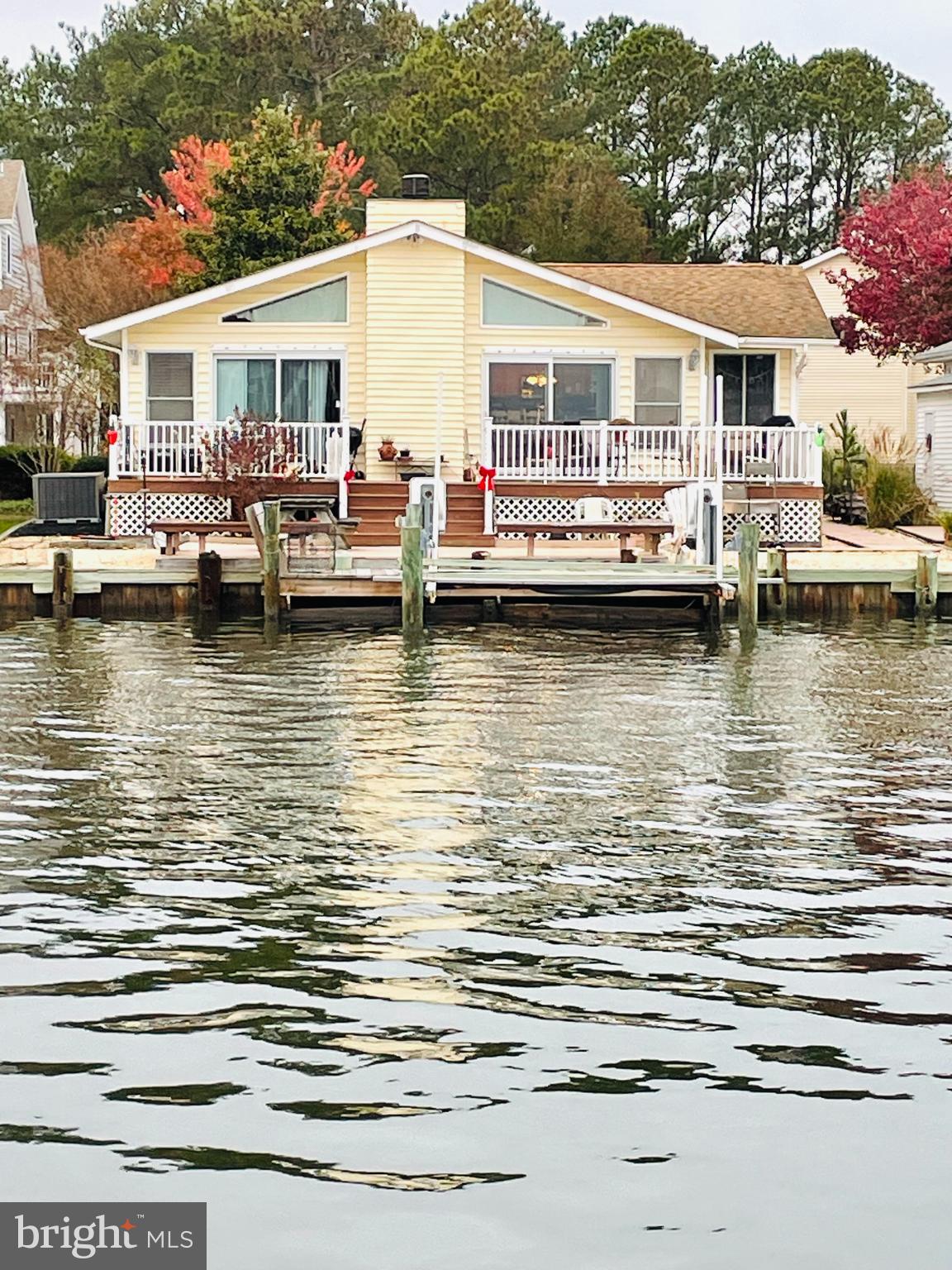 a front view of a house with a ocean view