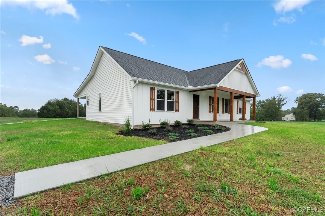 front view of a house with a yard