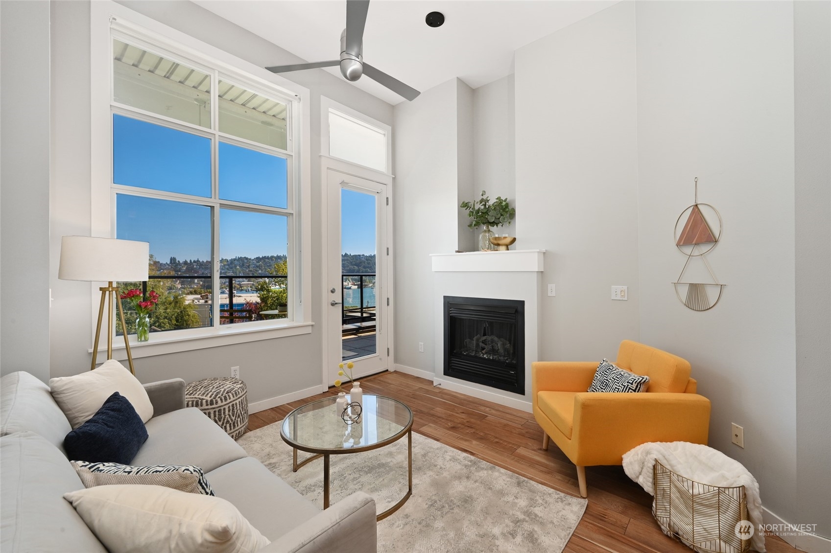 a living room with furniture and a fireplace