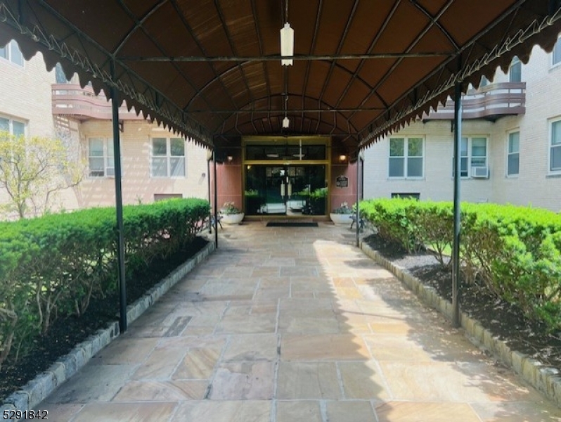 a view of a porch with garden