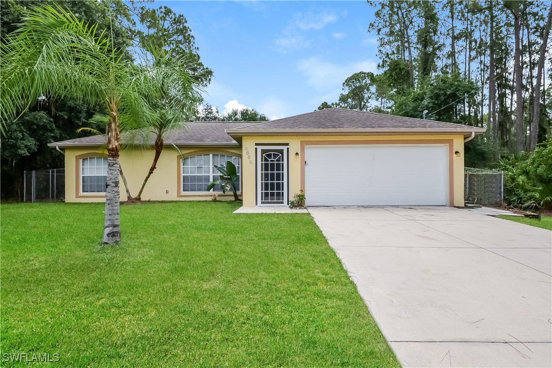 front view of a house with a yard