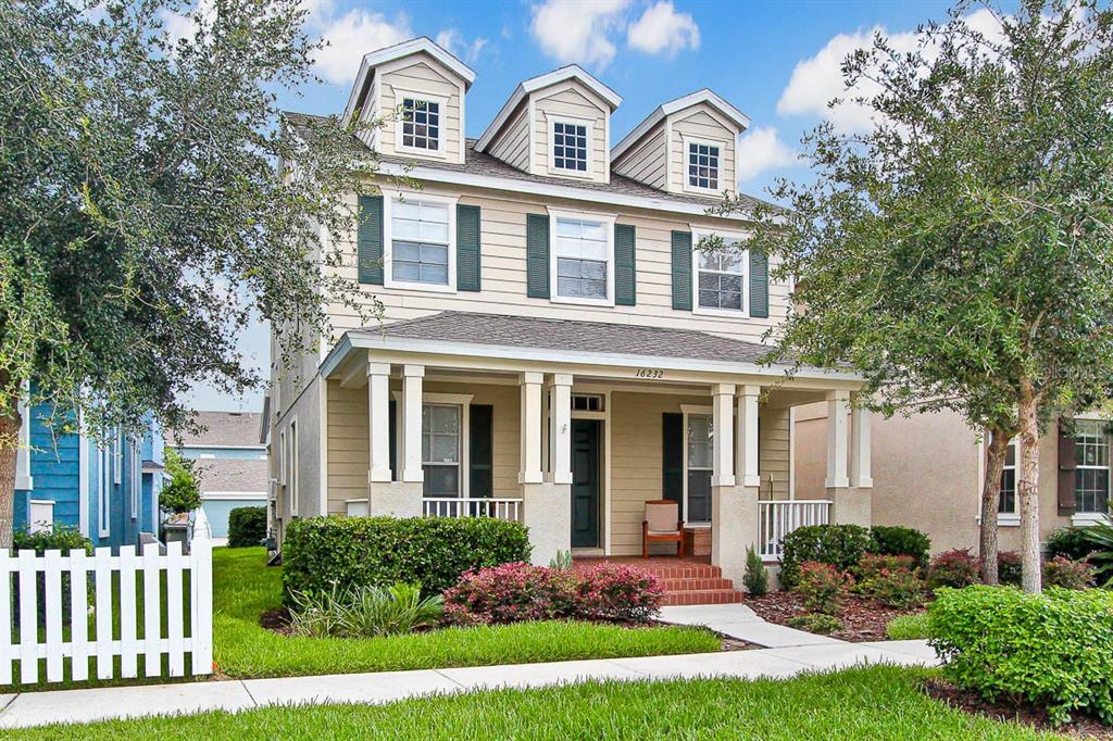 front view of a house with a yard