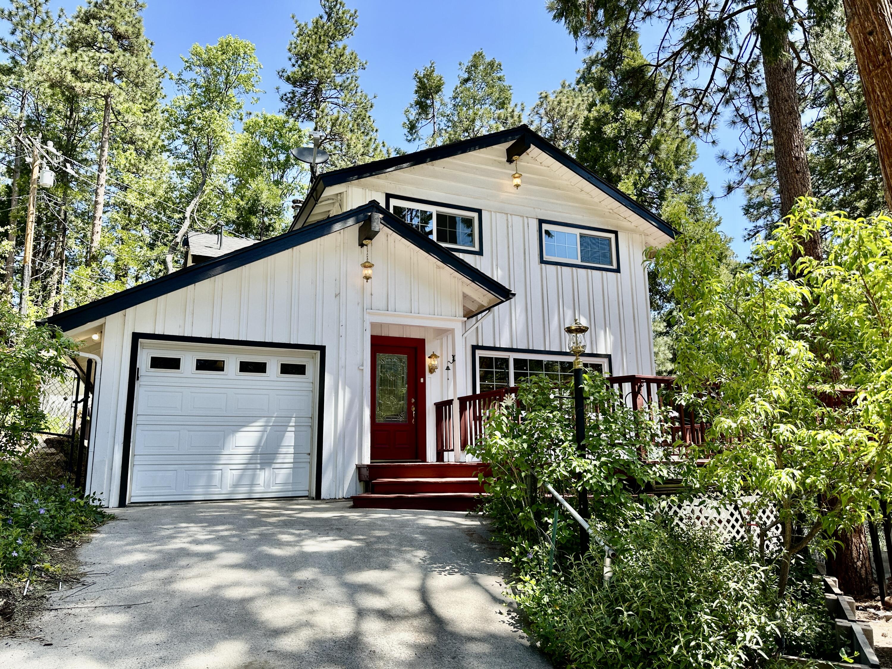 a house with trees in the background