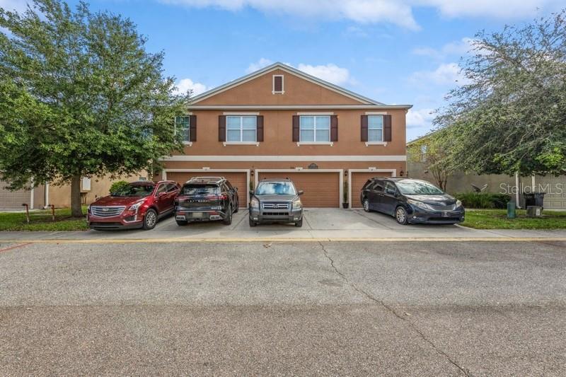 a car parked in front of a house