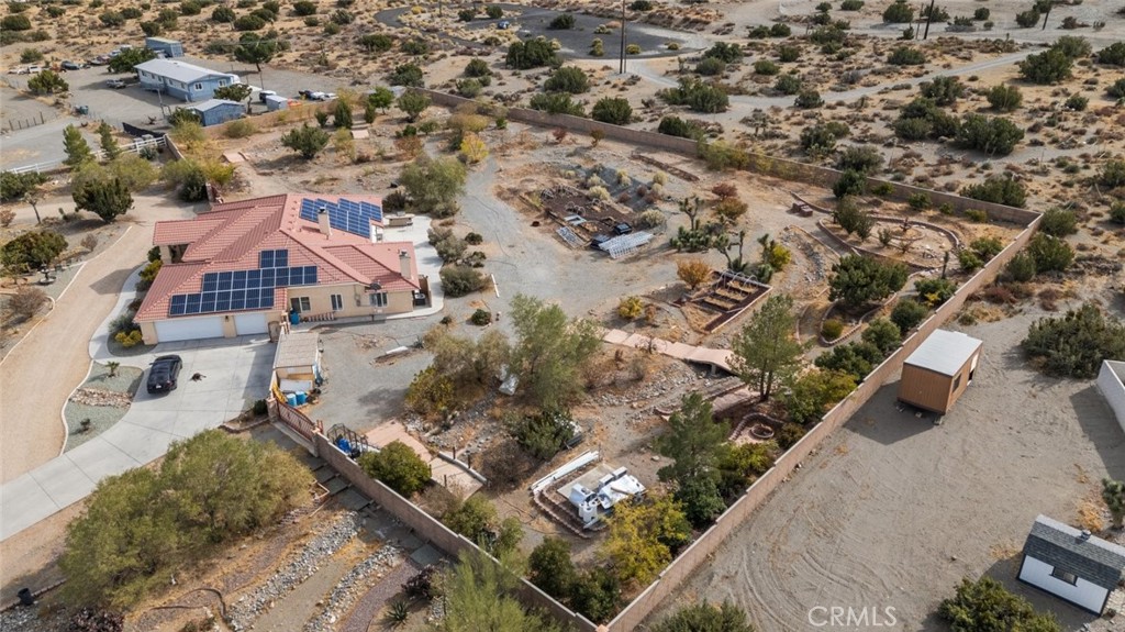 an aerial view of residential house with outdoor space