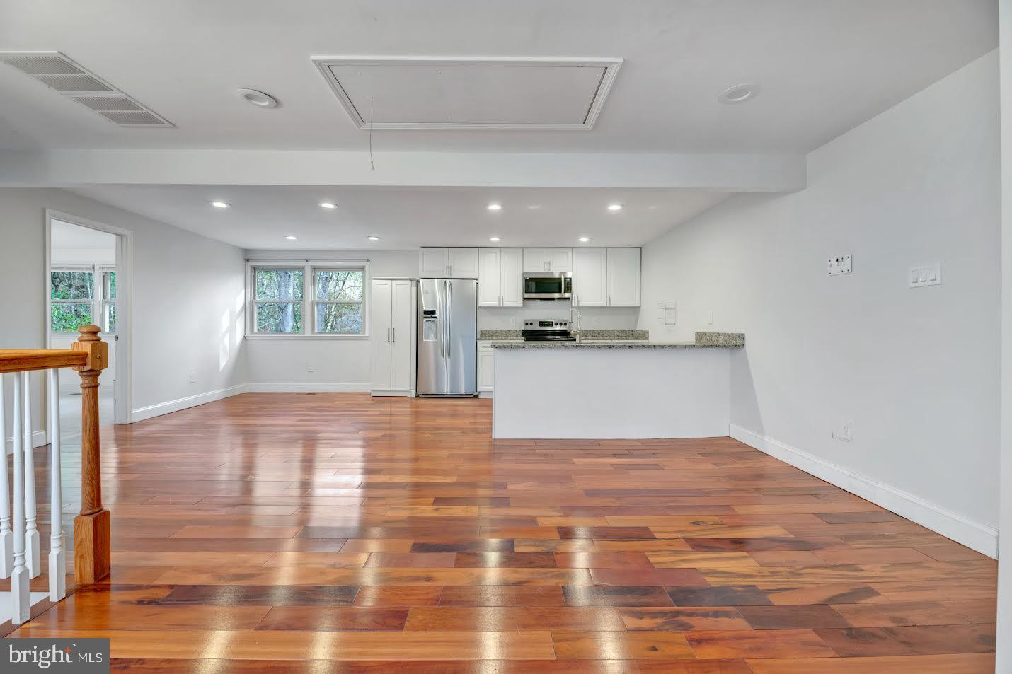 a view of kitchen with wooden floor