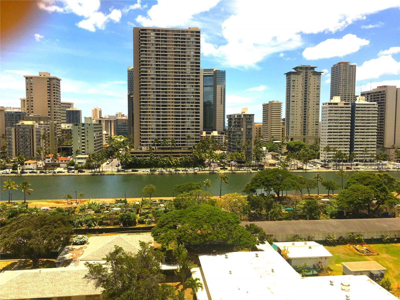 a view of a city with tall buildings