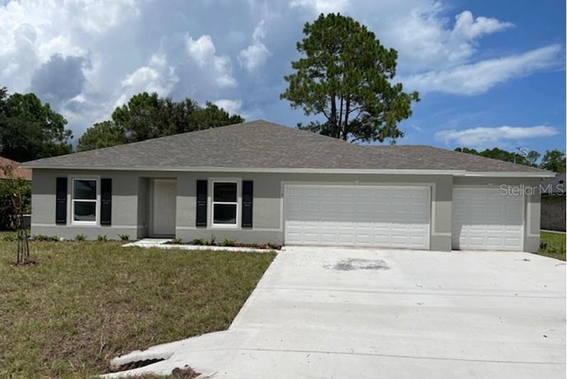 front view of house with a yard