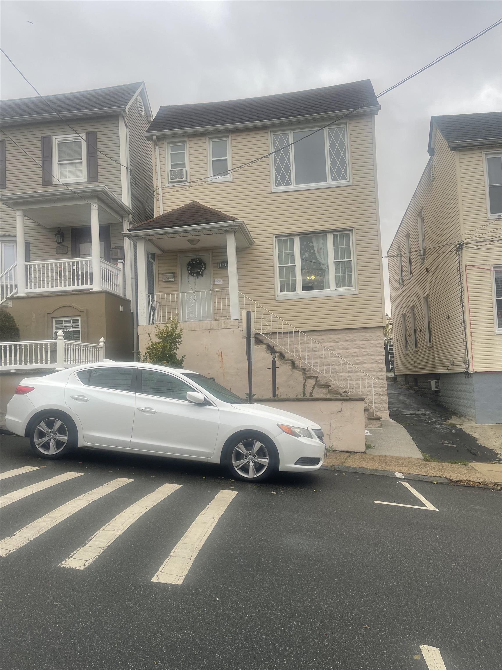 a view of a car parked in front of a building