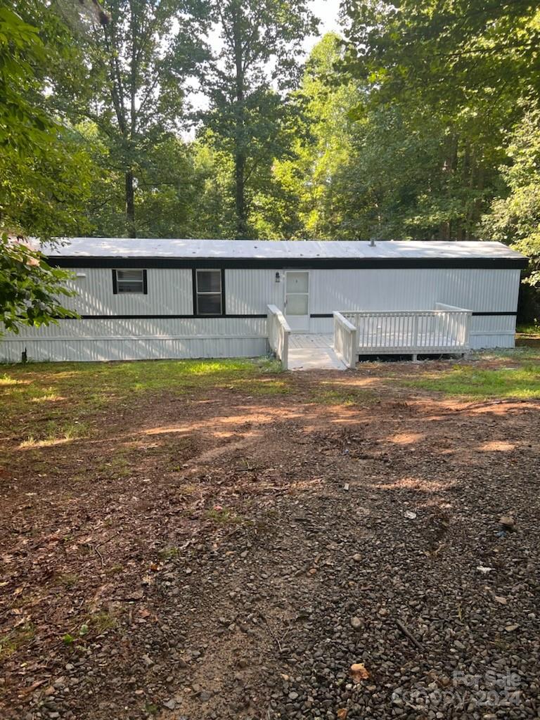 a view of a back yard of the house