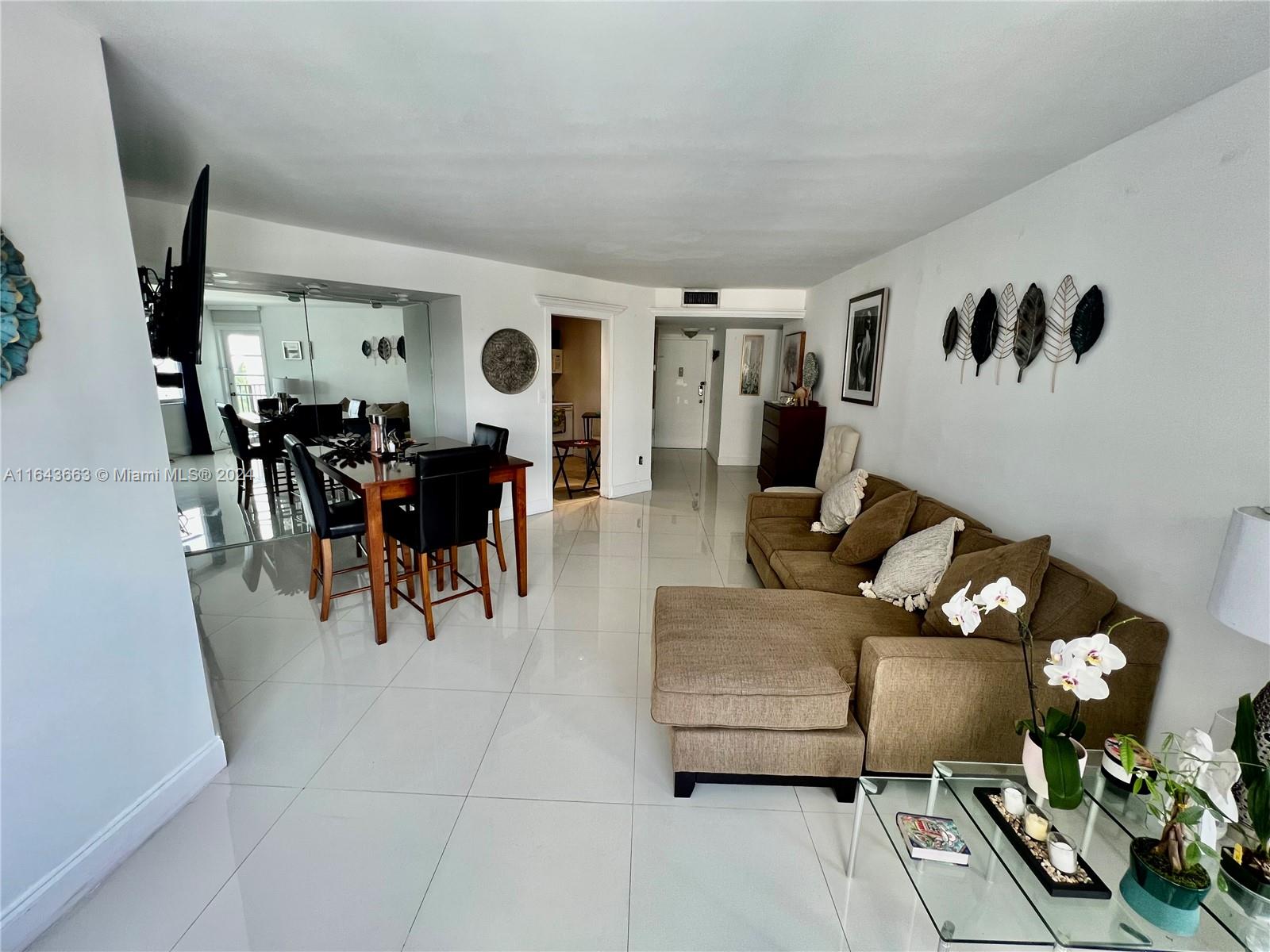 a living room with furniture and window