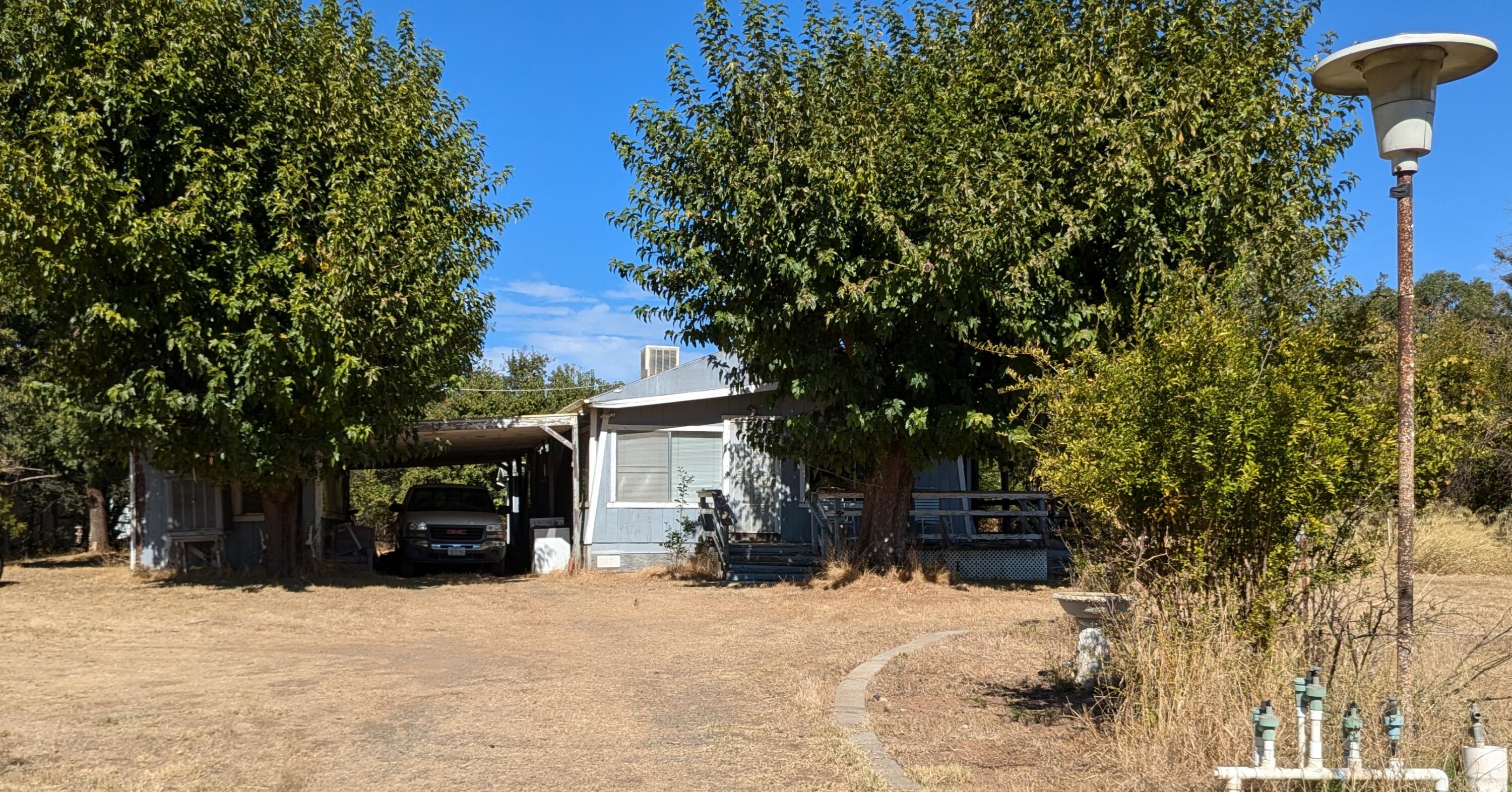 a view of house with a outdoor space