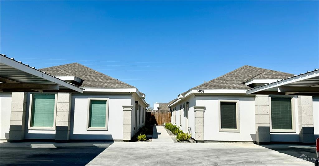 View of home's exterior with a patio