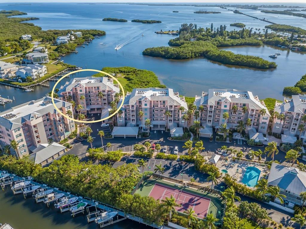 an aerial view of a house with a lake view