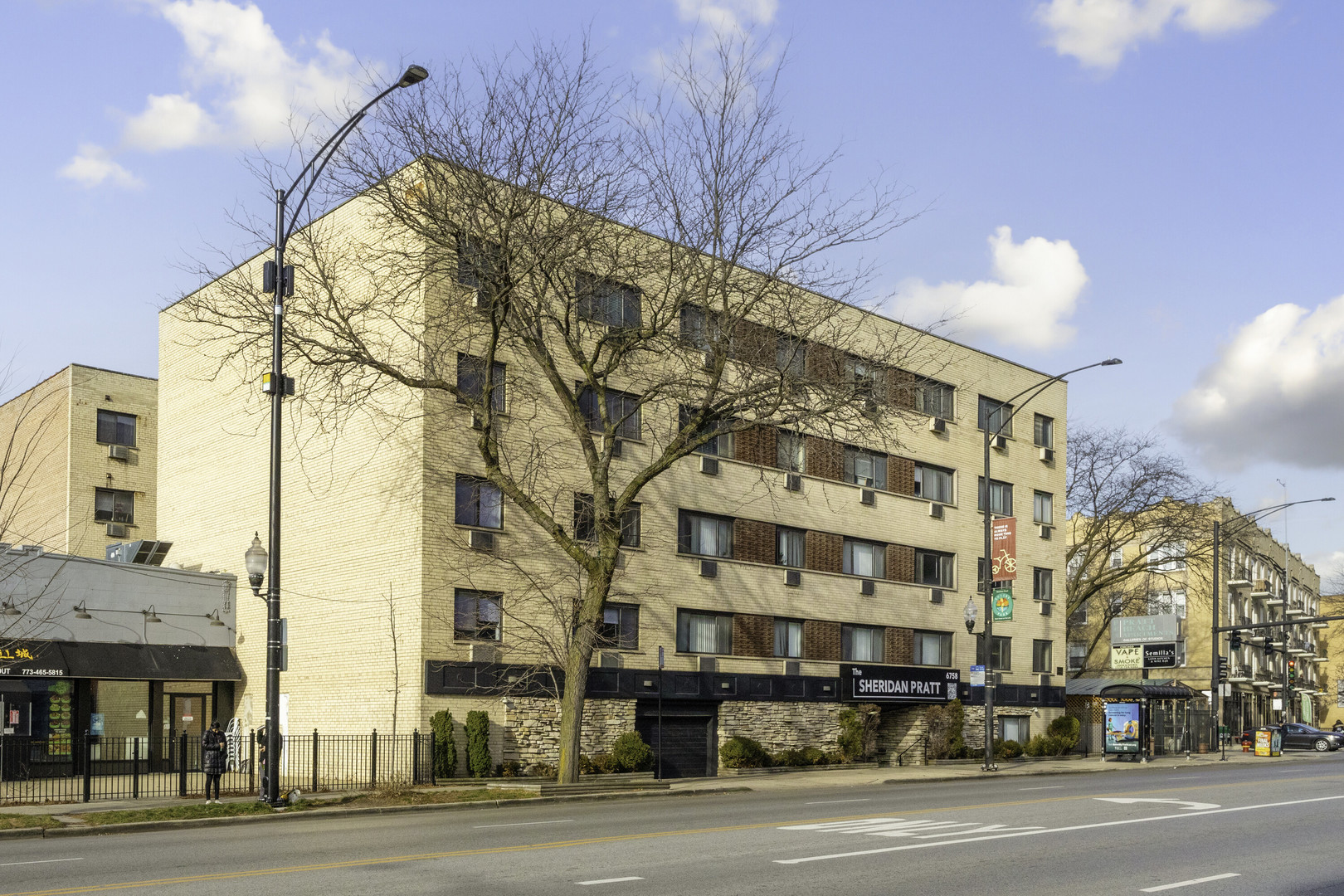 a view of a building and a street