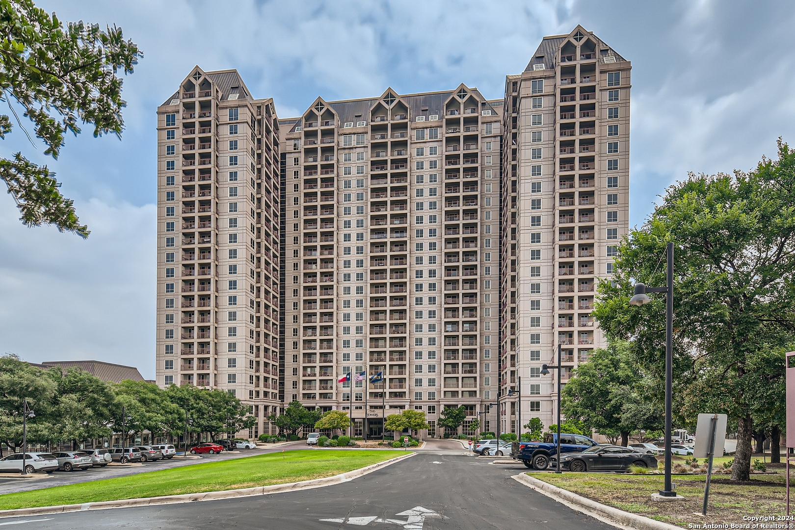 a front view of a building with a street