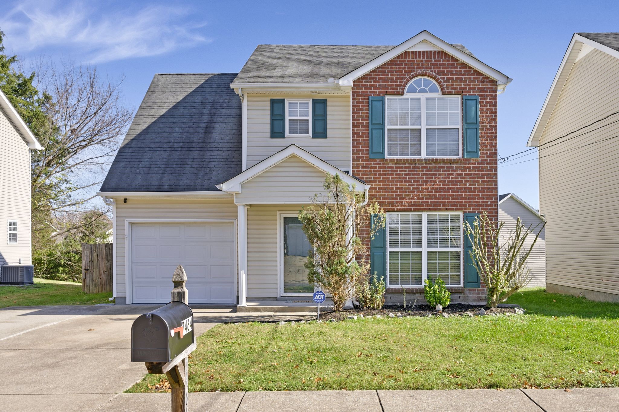 a front view of house with yard