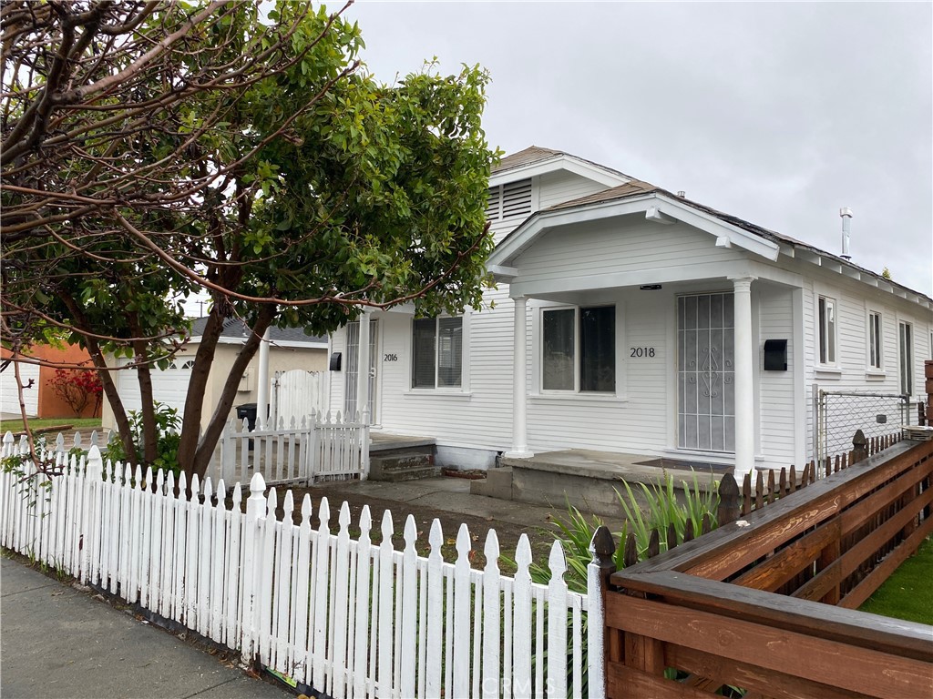 a front view of house yard with green space