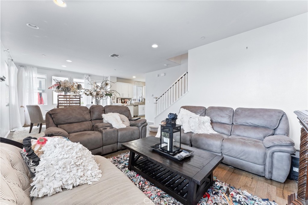 a living room with furniture and a couch