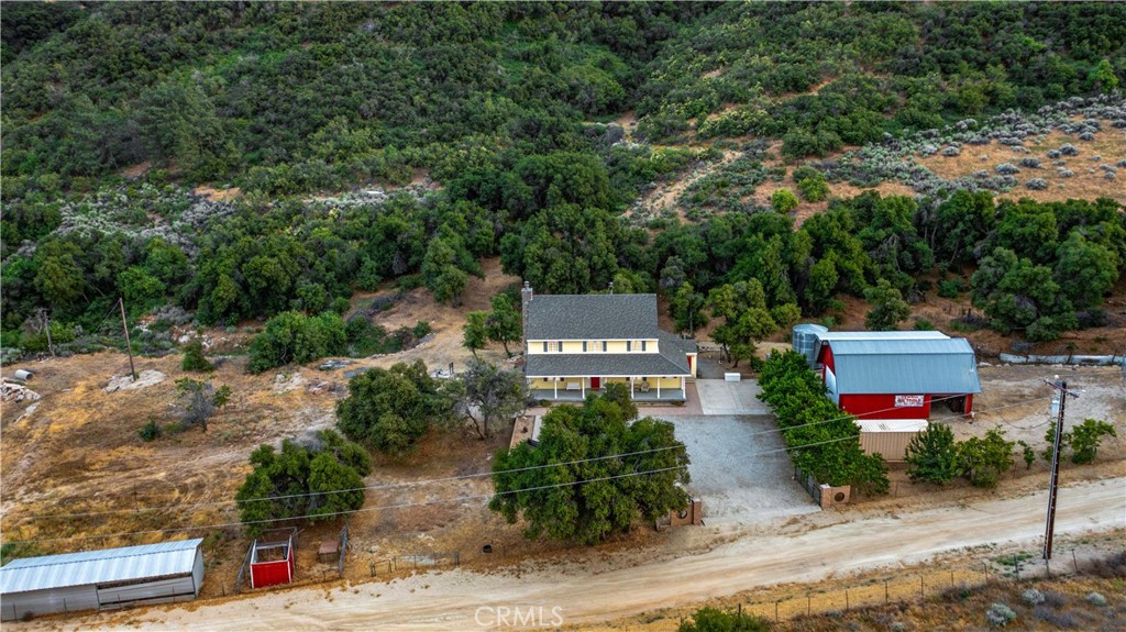 an aerial view of a house with a garden