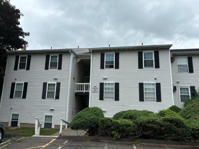 View of front of house with a balcony