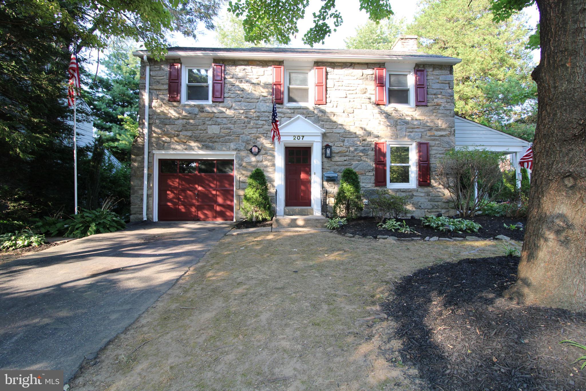 a front view of house with yard