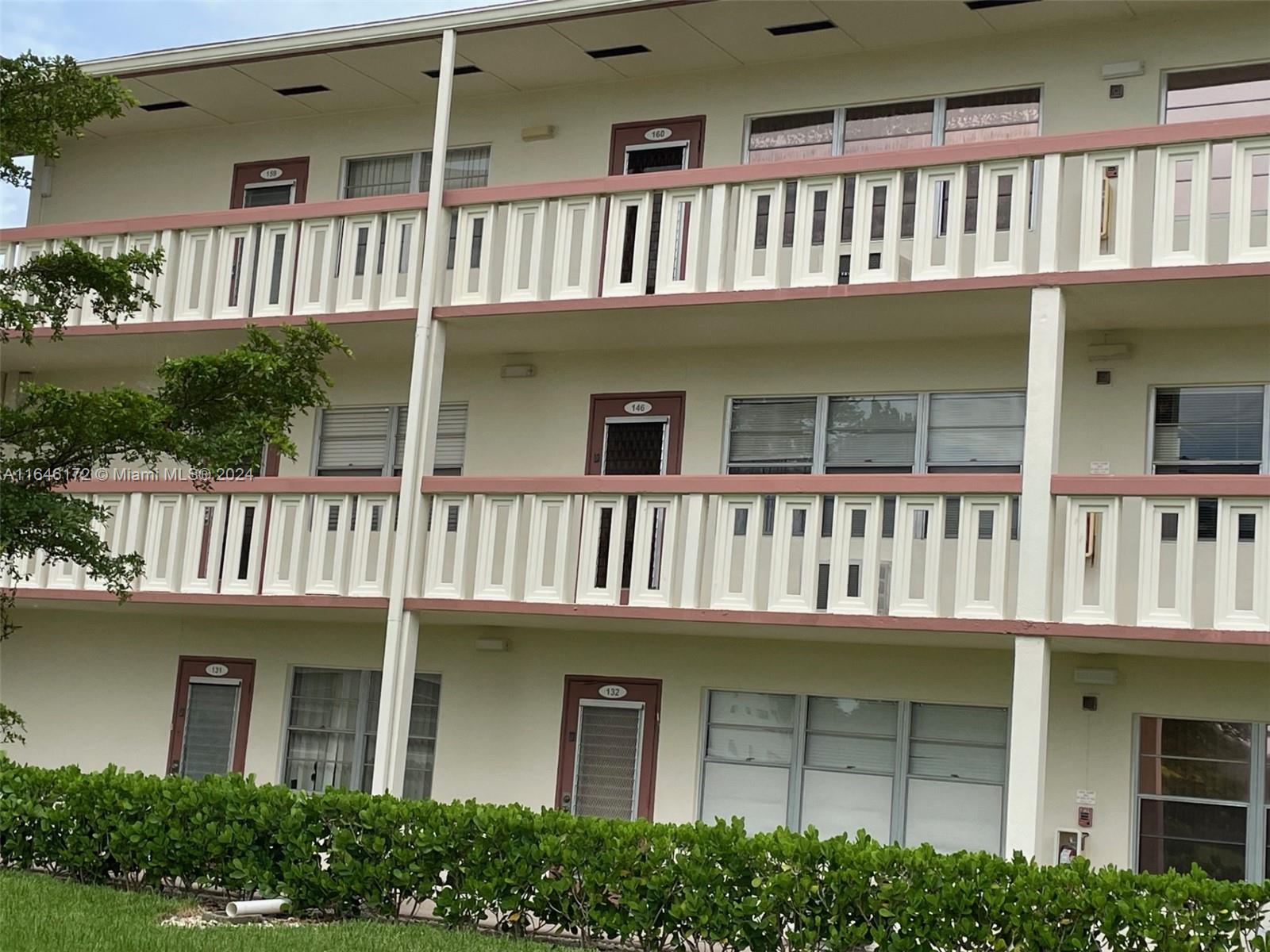 front view of a house with a deck