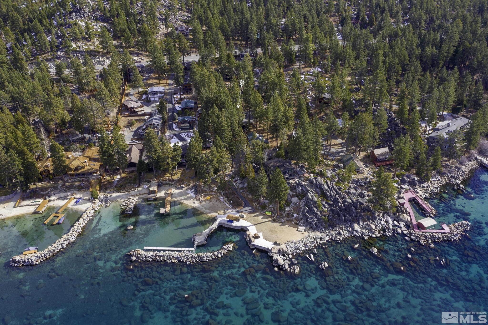 a aerial view of a house with a yard