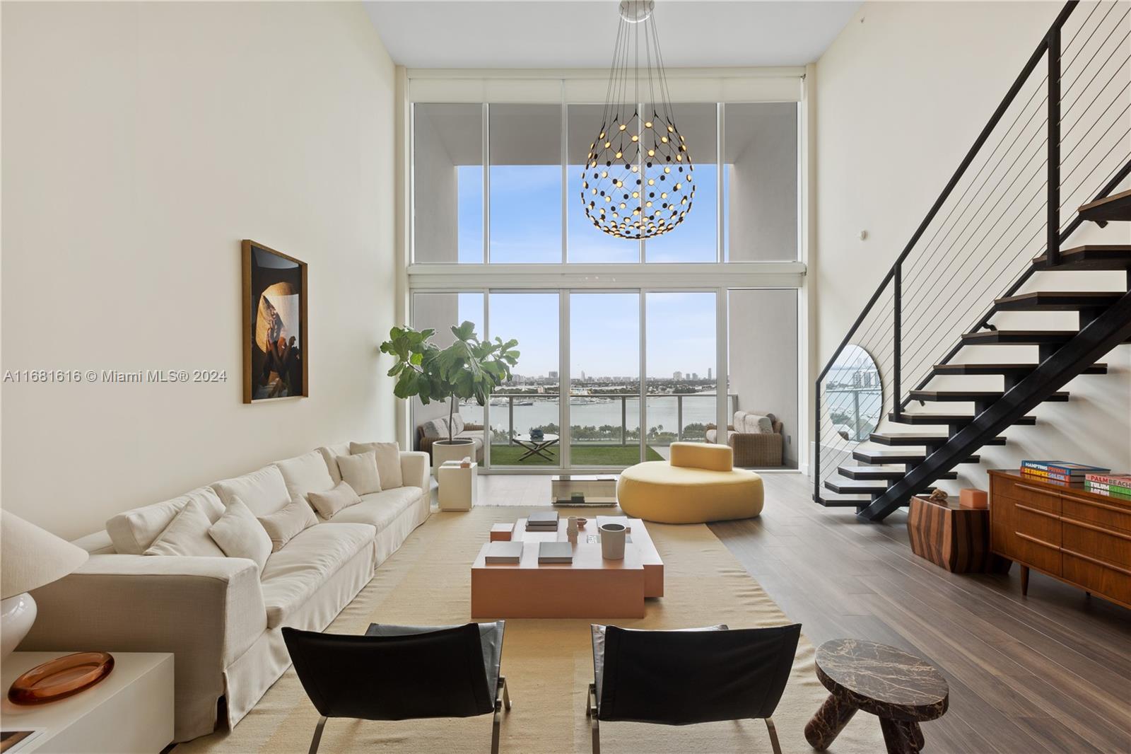 a view of a livingroom with furniture and a couch