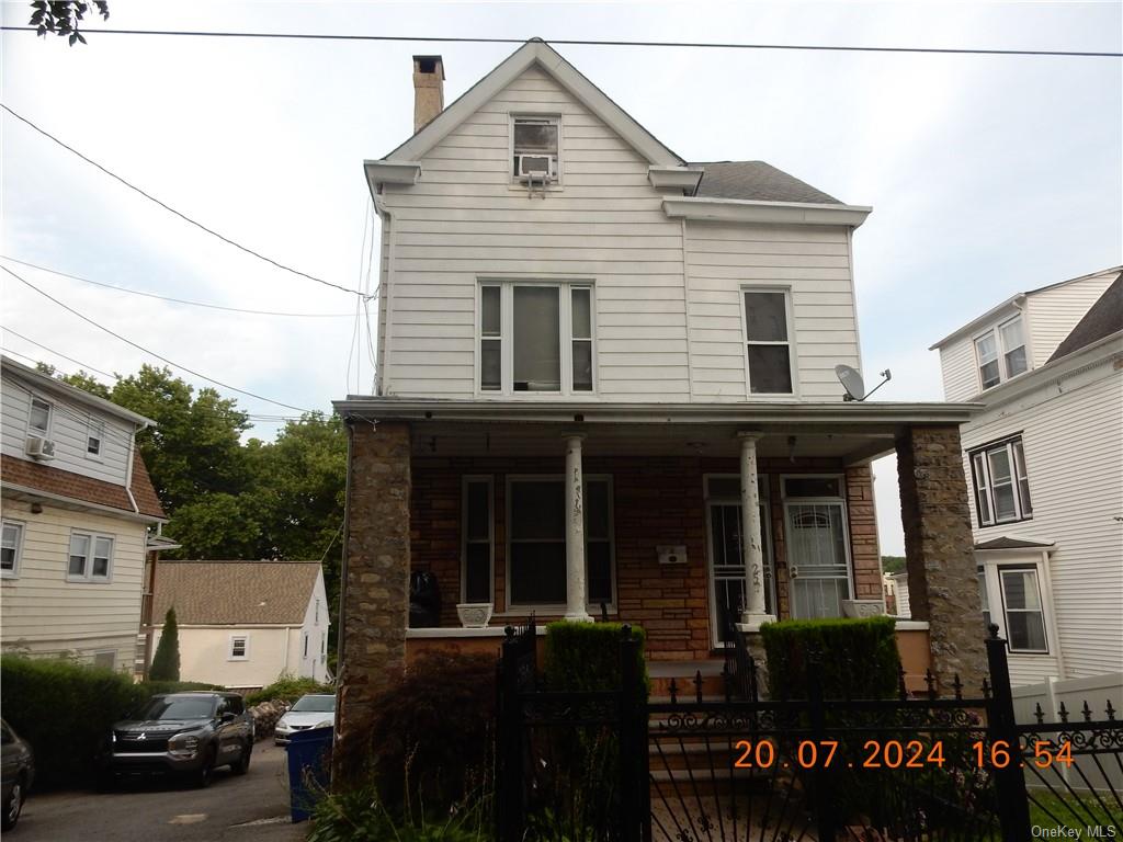 a view of a house with a porch