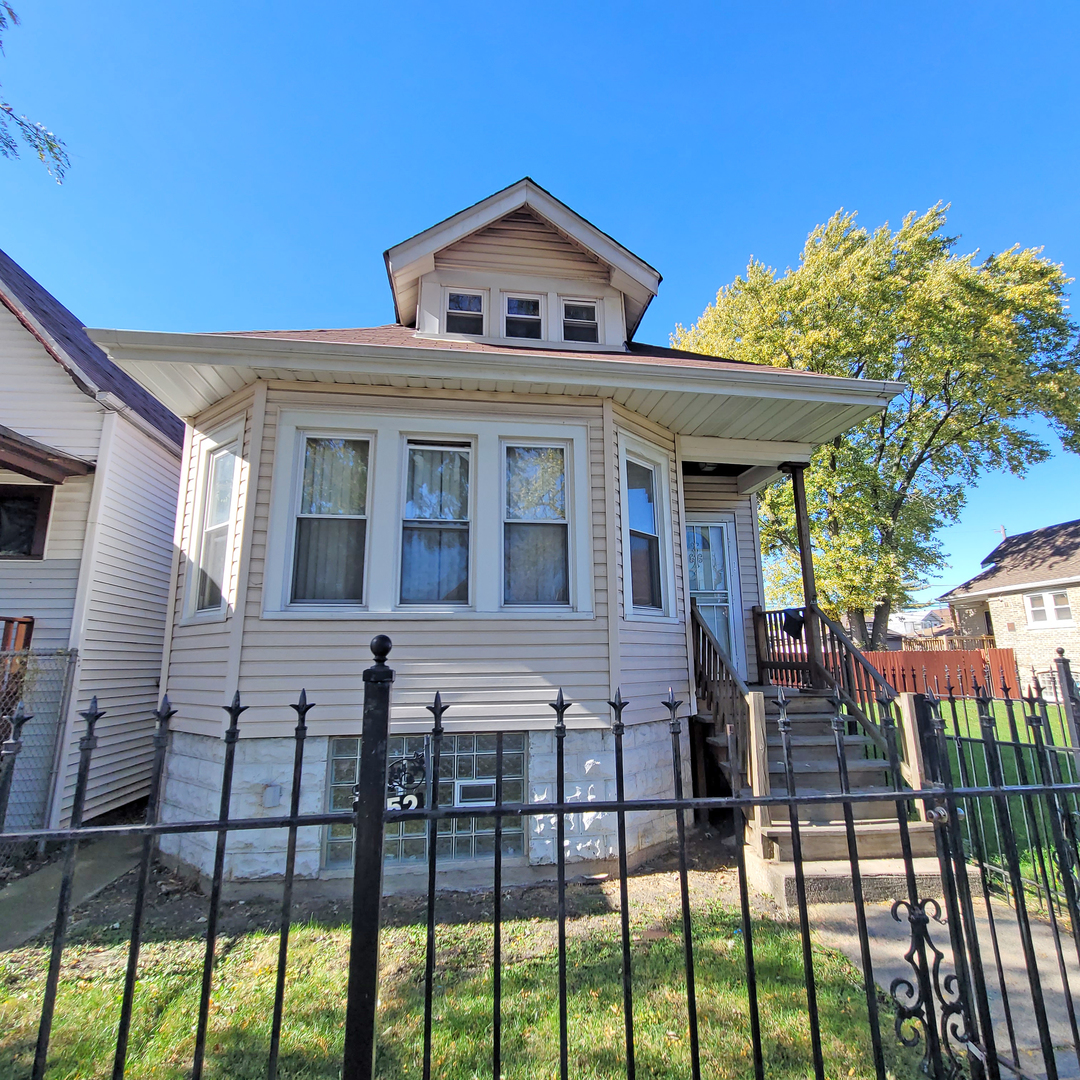 a front view of a house with a porch