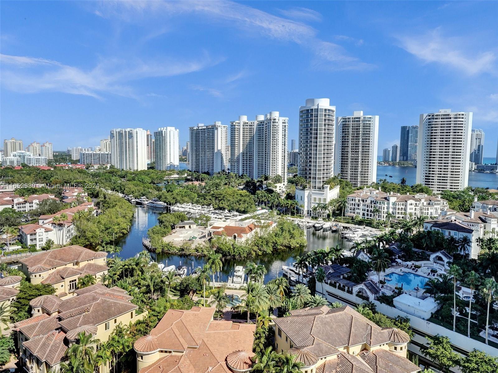 a view of a city with tall buildings