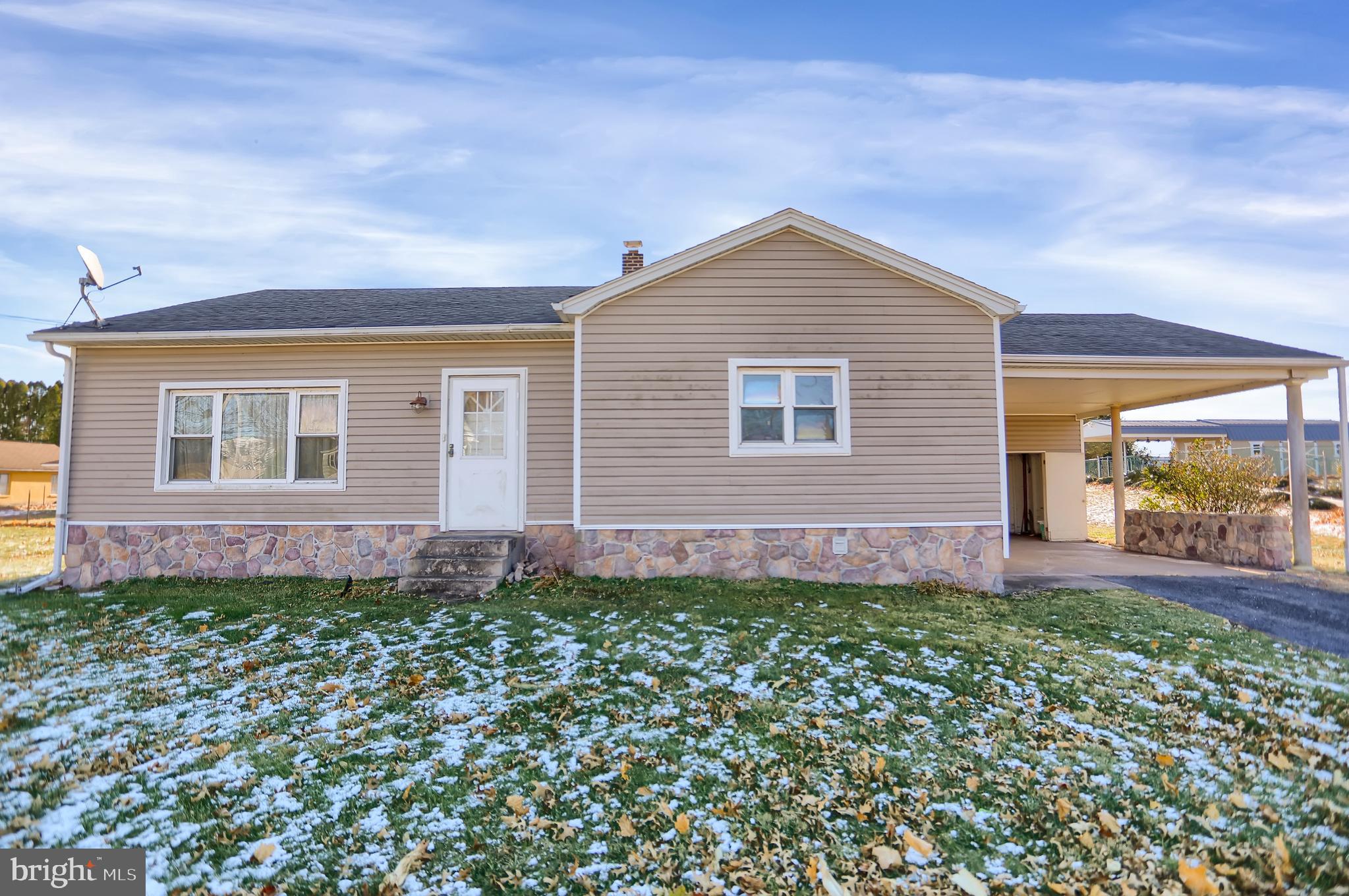 front view of a house with a yard