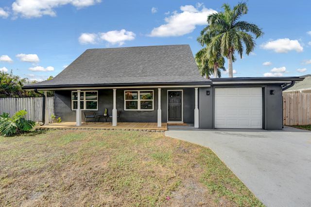 $400,000 | 313 Holly Drive | Royal Palm Estates