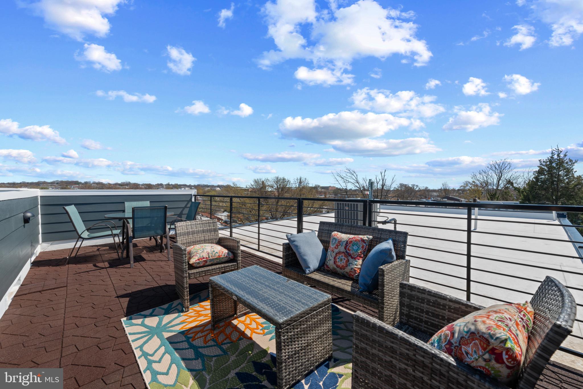 a view of a terrace with furniture