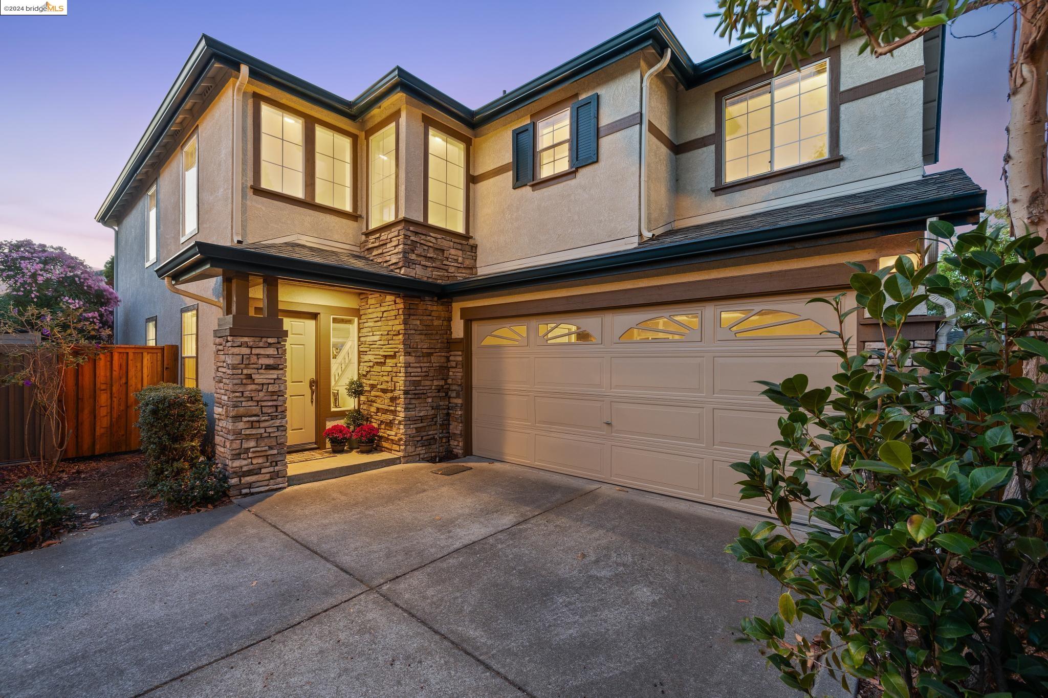 a view of a house with a garage