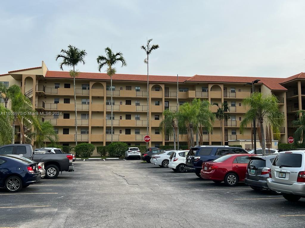 a cars parked in front of a building